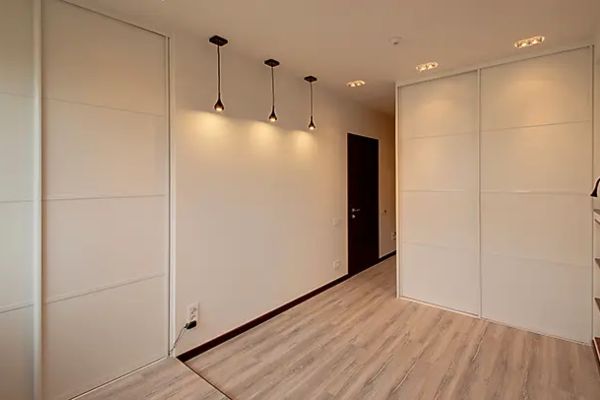 Armarios a medida con puertas correderas - Armarios AMP